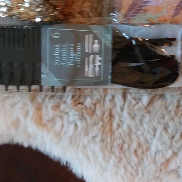 Gold Victoria's secret bag filled with a variety of beauty products. - Picture 6 of 13